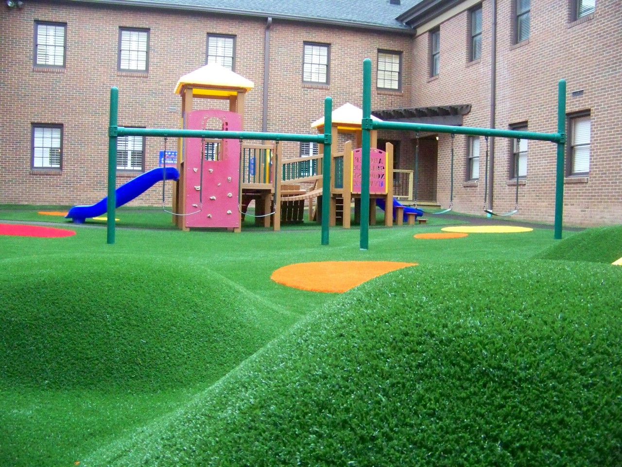 Hilly artificial turf playground by Southwest Greens of Tucson
